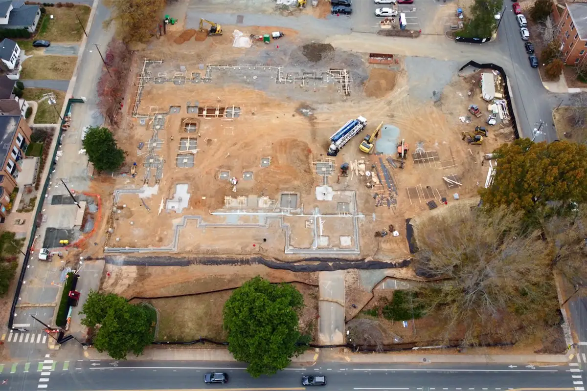 The outline of the building's footprint emerges in this aerial view