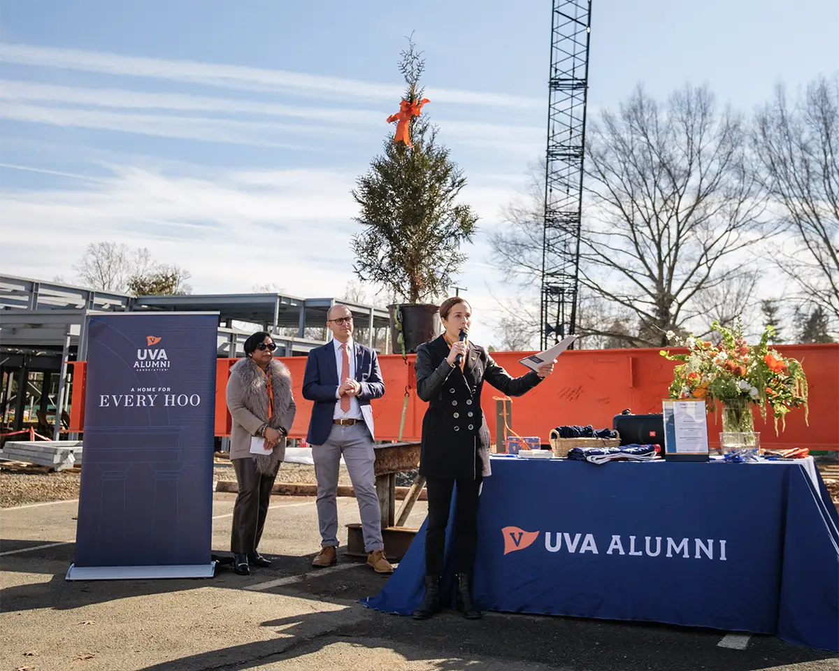UVA Alumni Association President & CEO Lily West addressing staff, board members, donors, construction team members, and more at the topping out ceremony