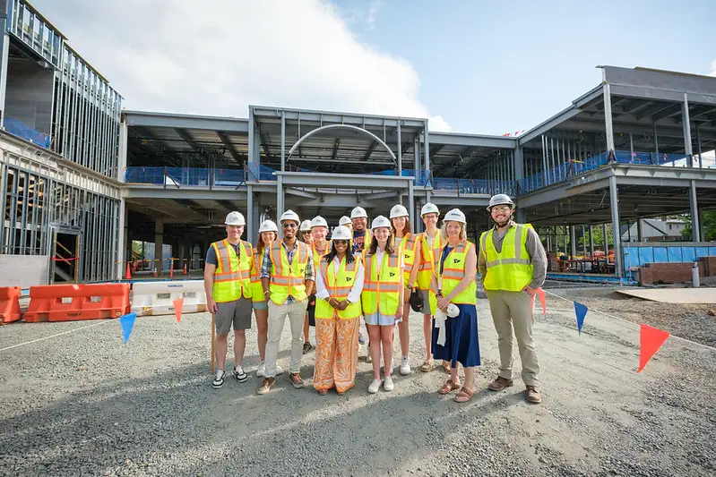 Reunion 2026 attendees take a hard hat tour of the future Home for Every Hoo