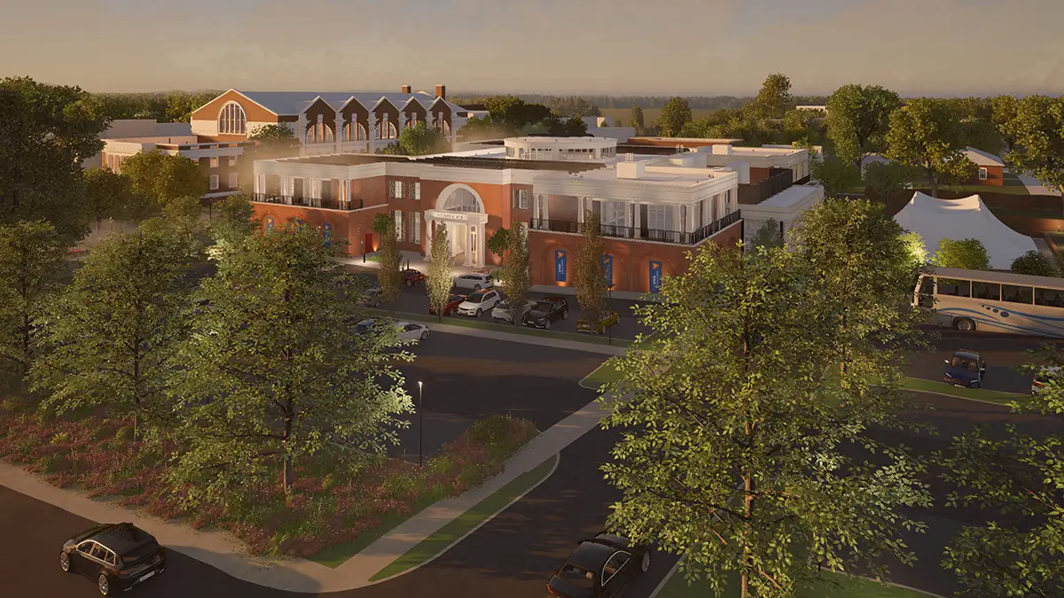 Aerial nighttime rendering of Aggarwal Hall, looking south from above Sprigg Lane. Parking will all be on the north side of Aggarwal Hall.
