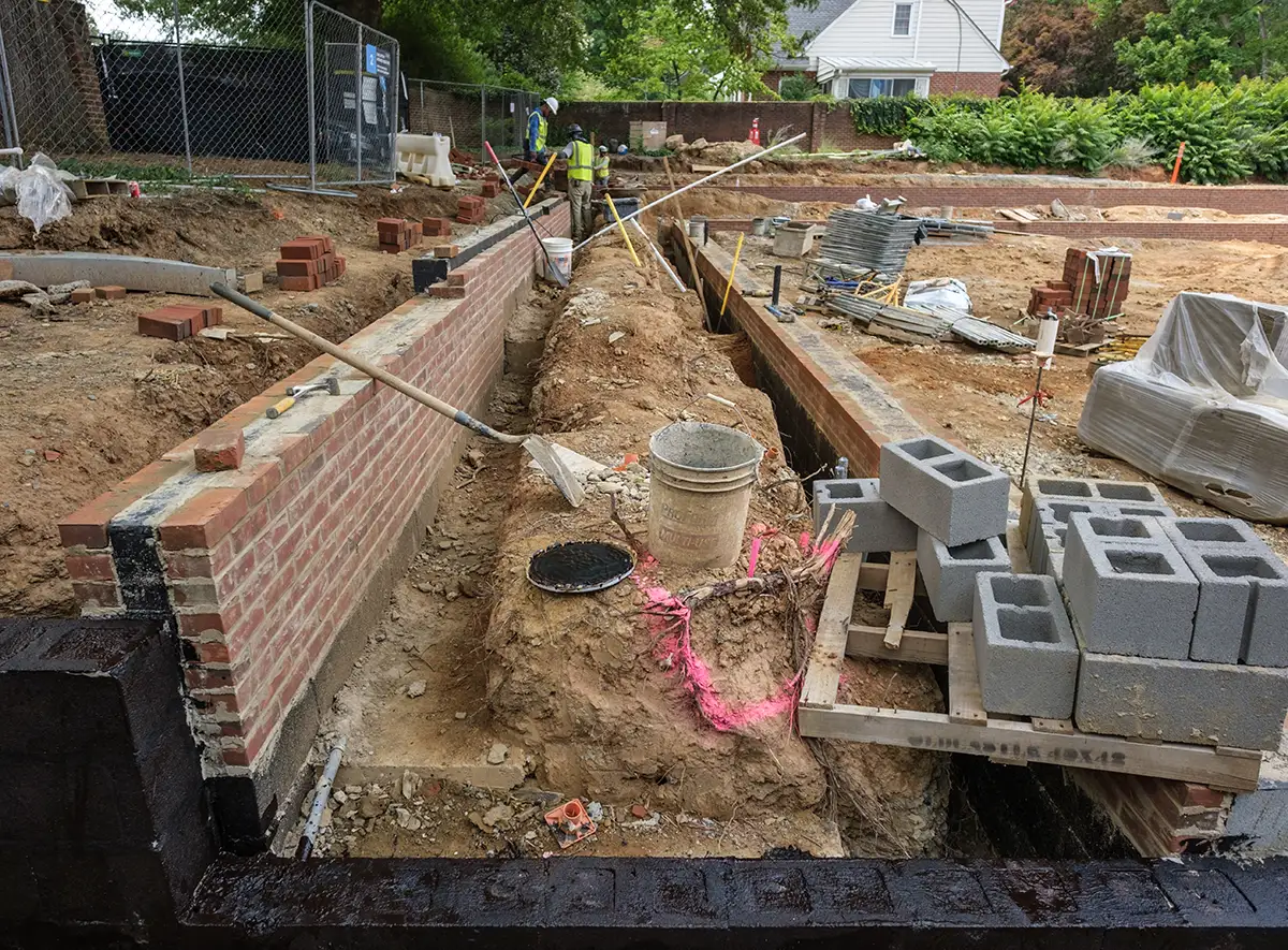 Work on the Event Patio continues as a larger welcoming space takes shape.