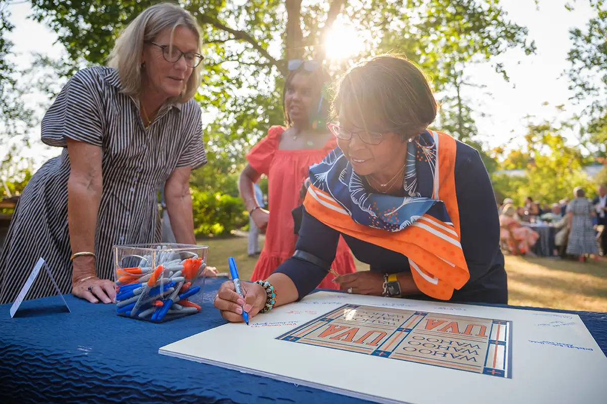 Alumni were invited to sign a framed piece of wallpaper from the former Alumni Hall bar, this will hang in a special location in the new space.