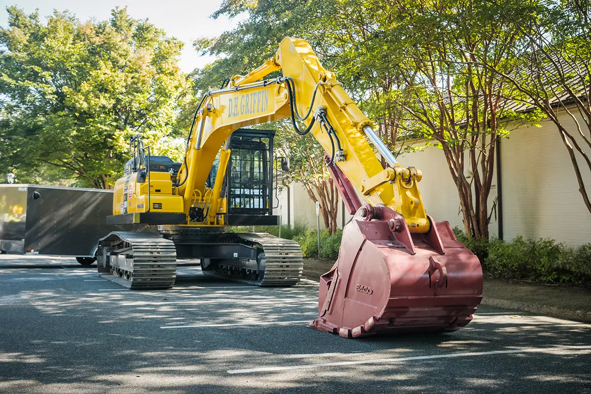 Construction equipment preparing for the demolition of Alumni Hall