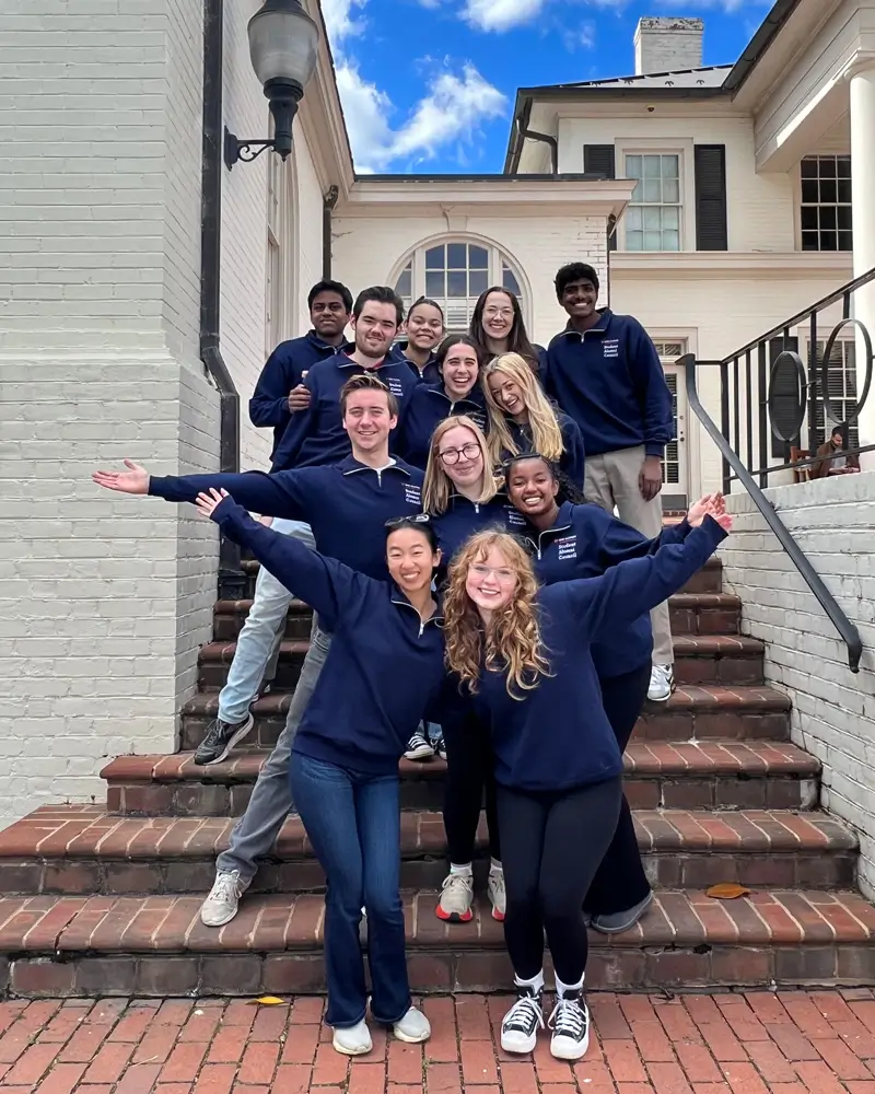 The Student Alumni Council in front of Alumni Hall
