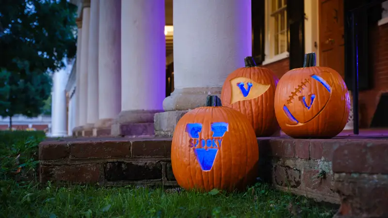 Desktop background: UVA-themed jack-o-lanterns on the Lawn