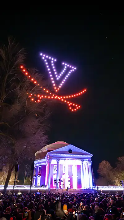 Phone background: The V-Sabre formed by drones over the Rotunda during Lighting of the Lawn
